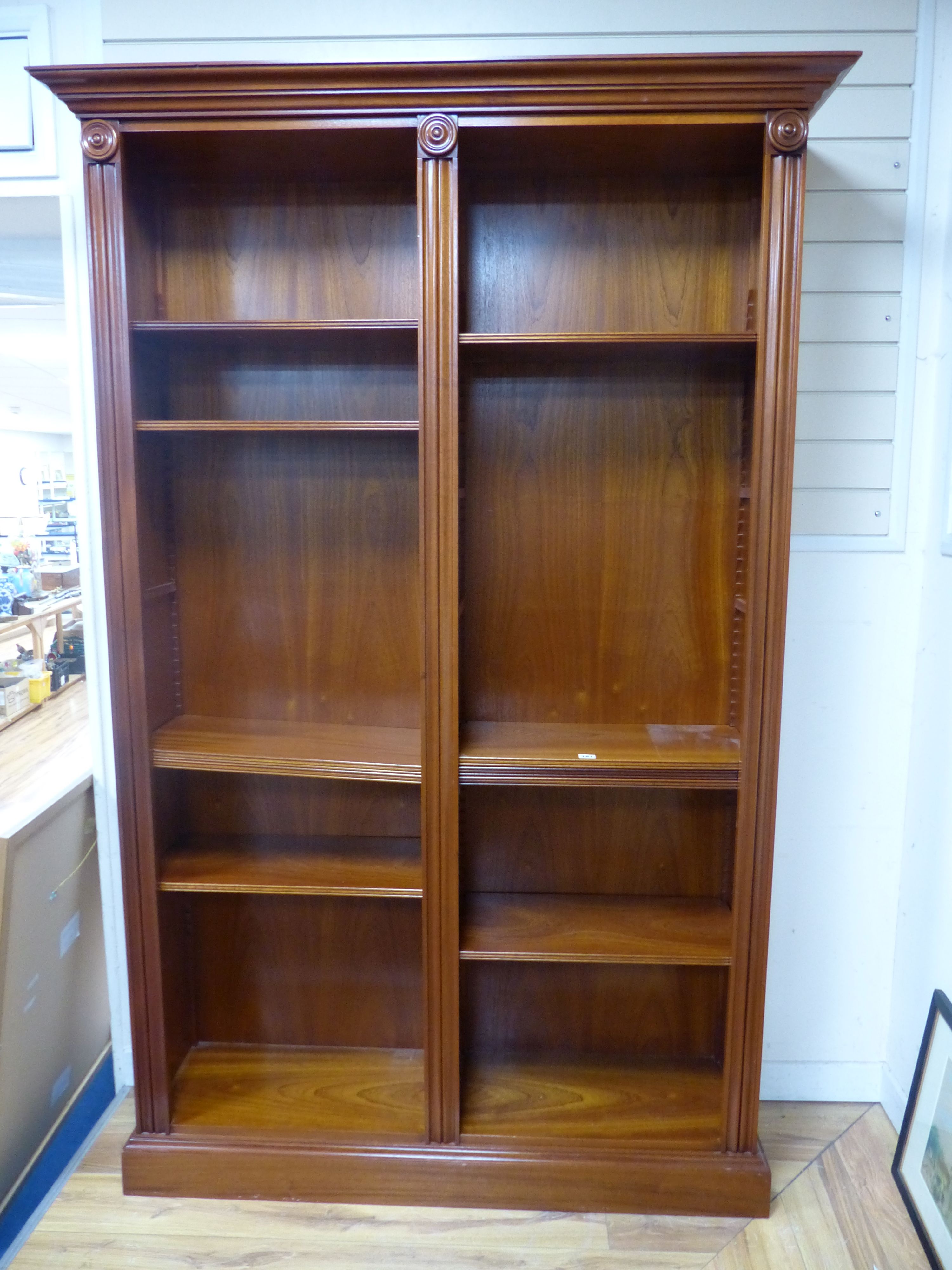A Regency style mahogany open bookcase, width 136cm, depth 38cm, height 214cm